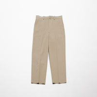 chino cloth trousers creased